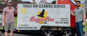 Bayou Bins trash bin cleaning service truck with branding and contact information on vehicle